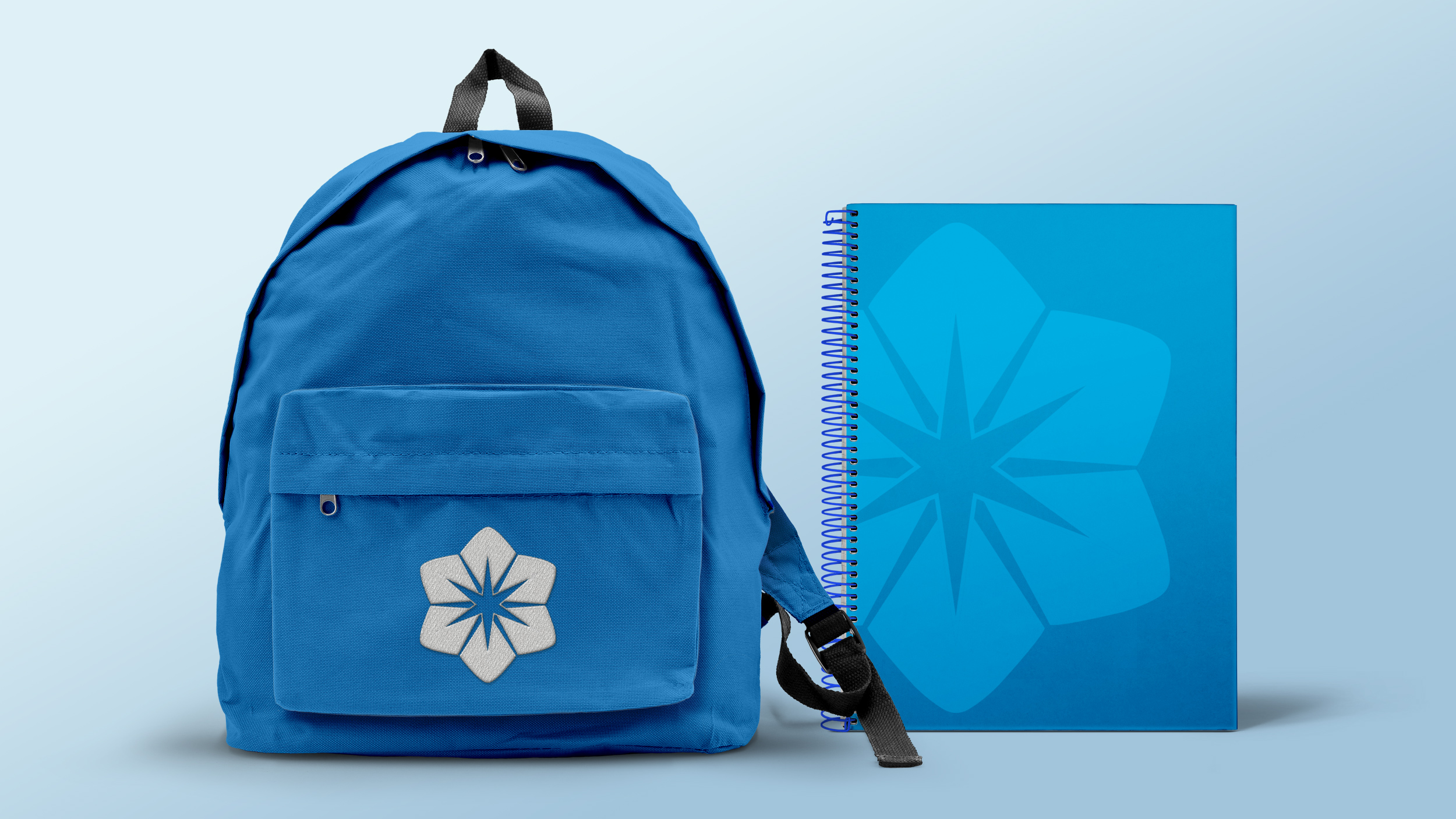 Branded school bag and notebook for St Mary's Gerrards Cross