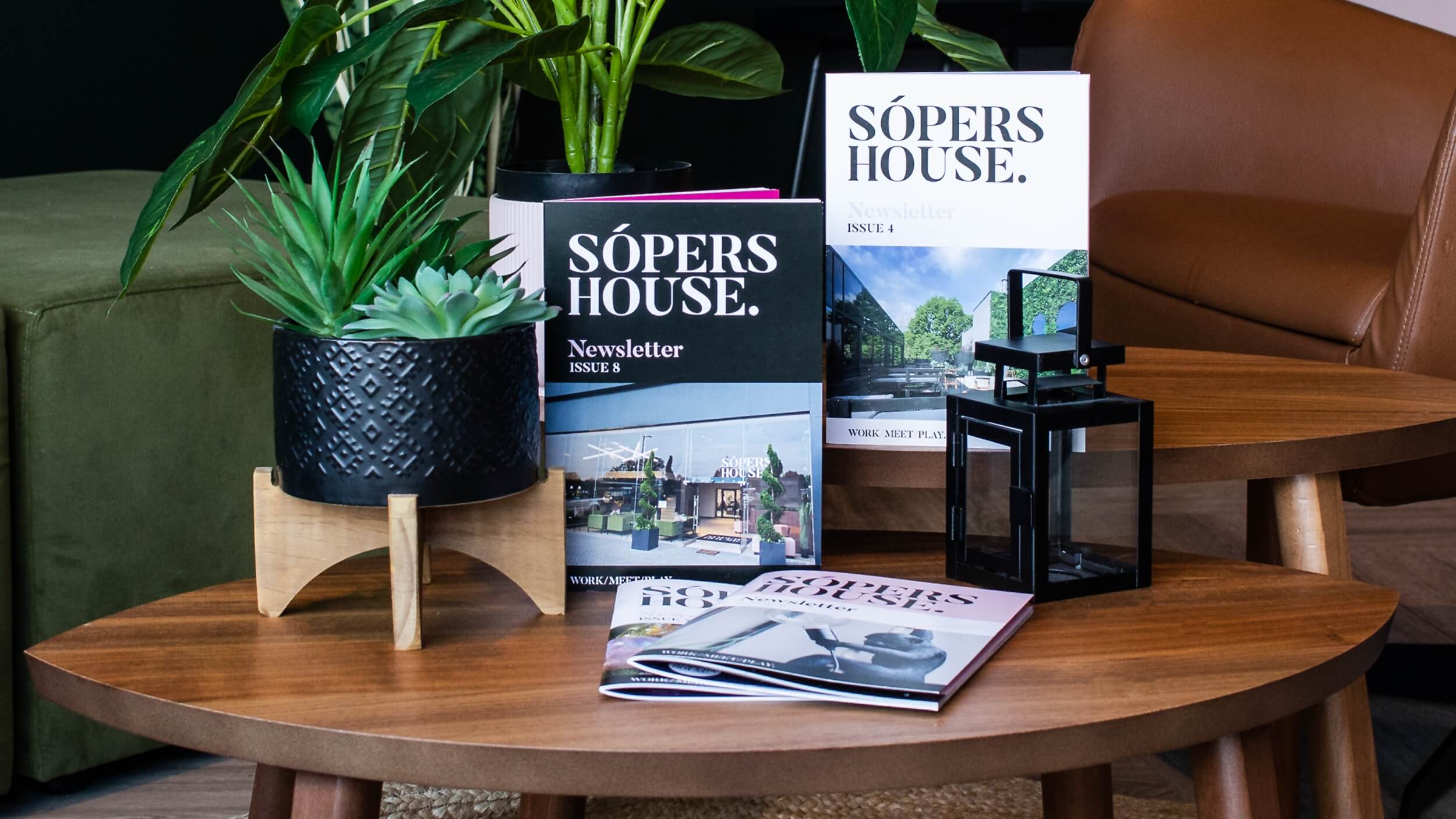 Sopers House newsletters displayed on a table