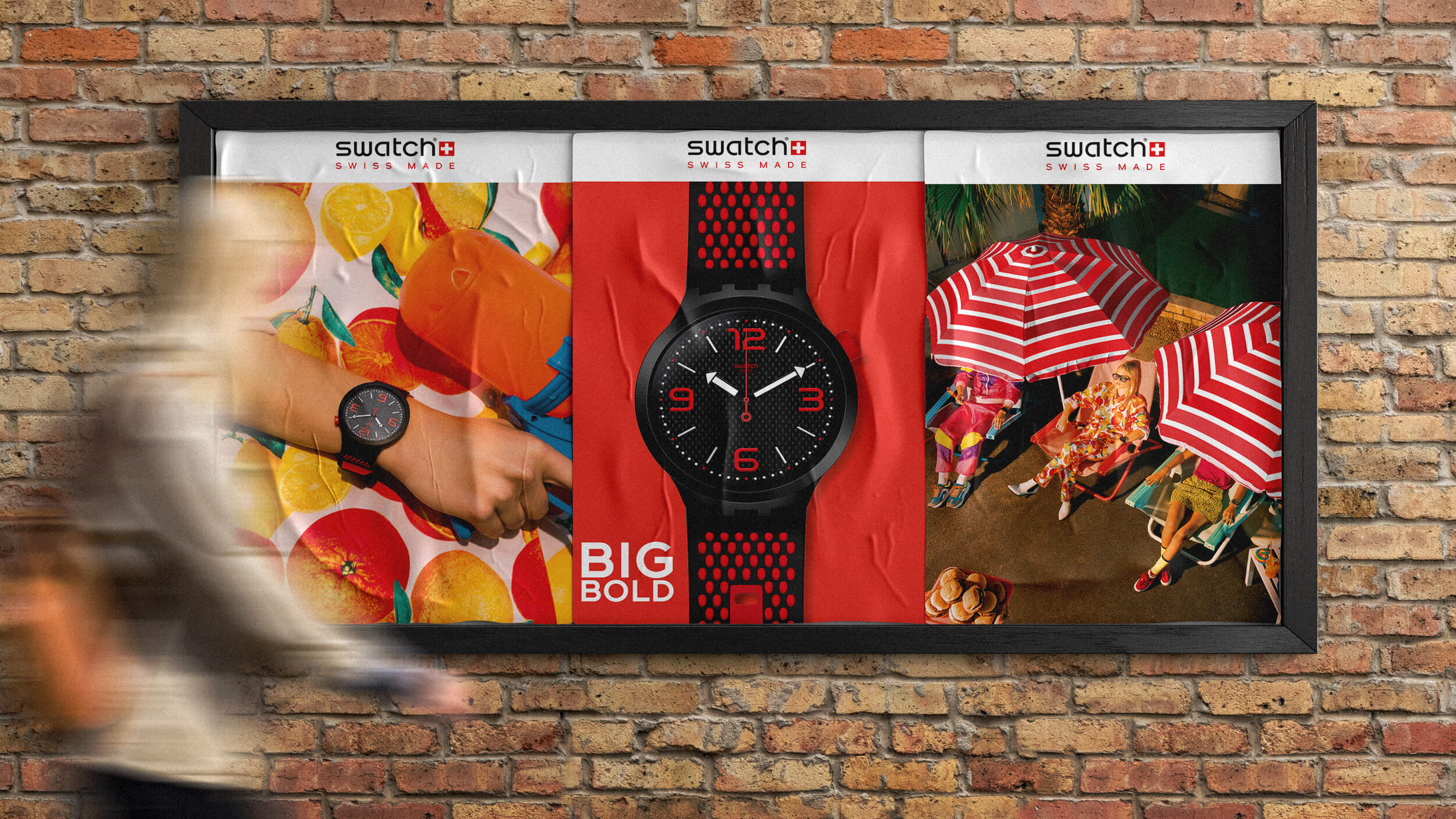 Swatch posters on a billboard with close up of watches